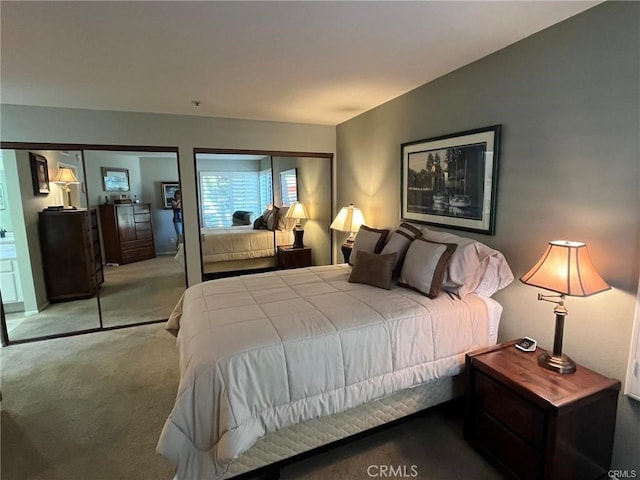 bedroom with light colored carpet