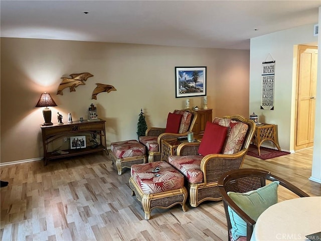 sitting room with light hardwood / wood-style flooring