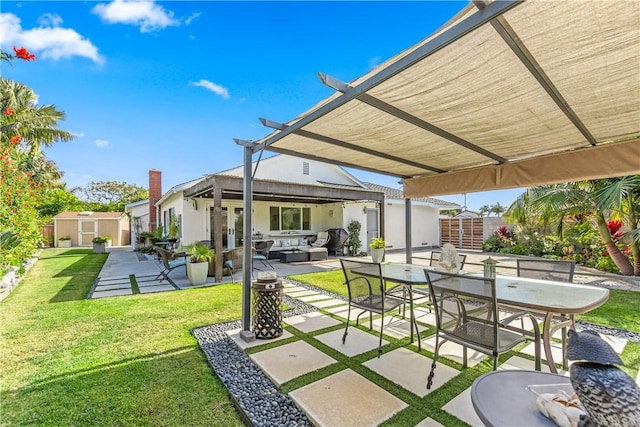 view of patio / terrace with outdoor lounge area, a storage shed, and a pergola