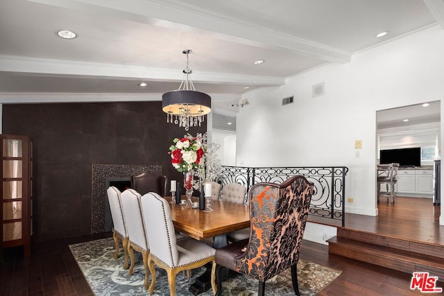 dining space with beam ceiling, a notable chandelier, and dark wood-type flooring