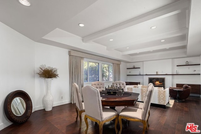 dining space with dark hardwood / wood-style floors and beam ceiling