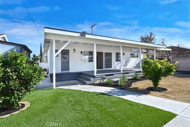 bungalow-style house with a porch and a front yard