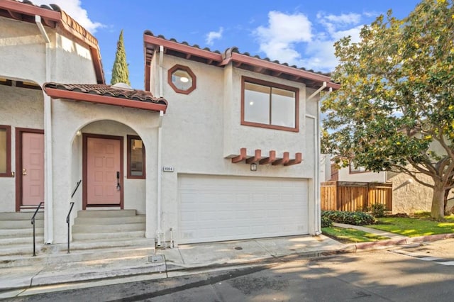 view of front of property featuring a garage