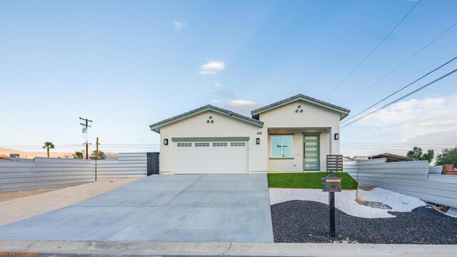 view of front of home with a garage