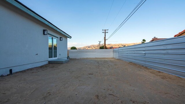 view of yard with a mountain view