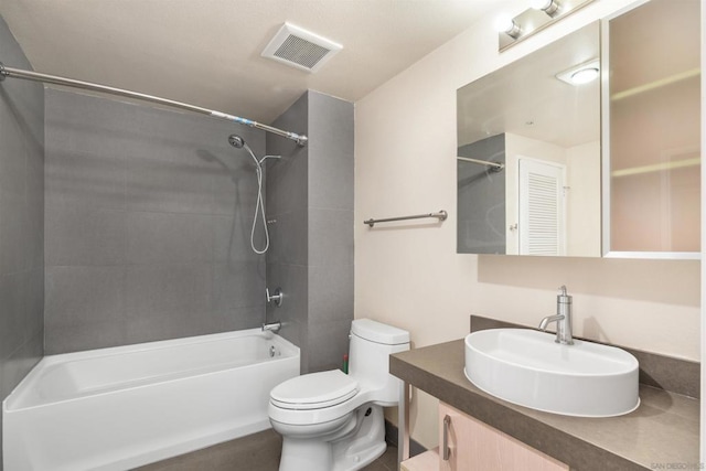 full bathroom featuring toilet, vanity, and bathing tub / shower combination