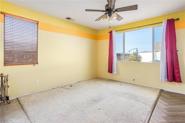 empty room featuring ceiling fan