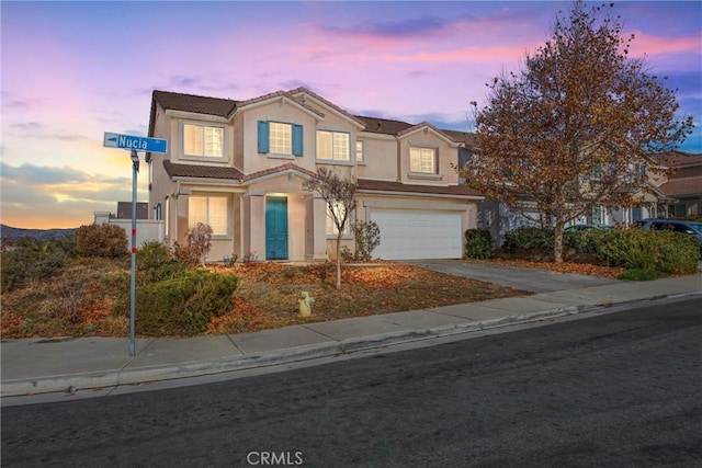 view of front of home featuring a garage