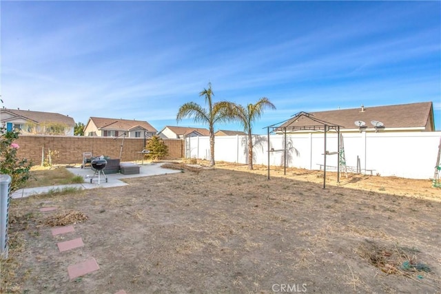 view of yard with a patio area and a gazebo