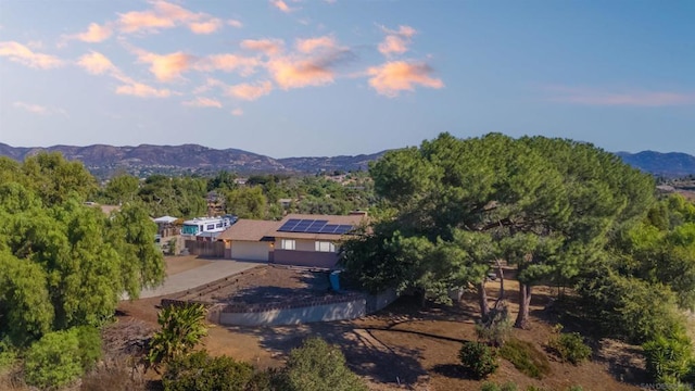 drone / aerial view featuring a mountain view