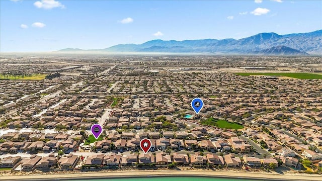 drone / aerial view featuring a mountain view