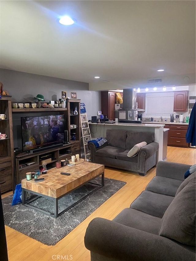 living room with light wood-type flooring