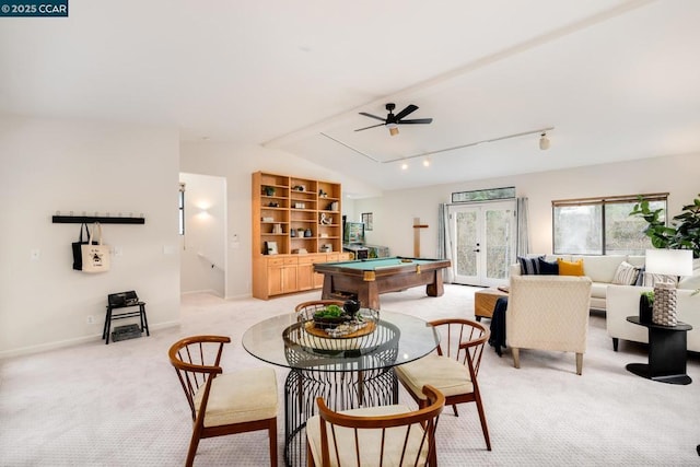 carpeted dining area with ceiling fan, billiards, rail lighting, and lofted ceiling with beams