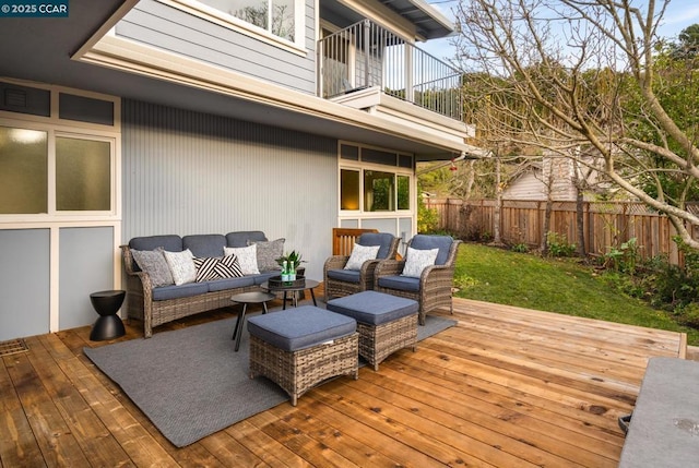 wooden deck featuring outdoor lounge area