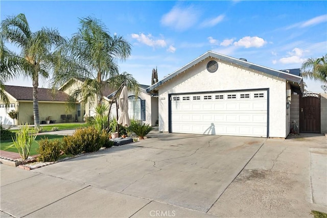 ranch-style home with a garage