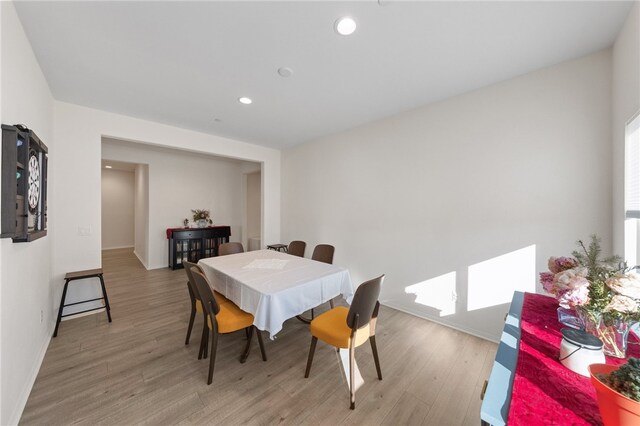 dining space featuring light hardwood / wood-style flooring