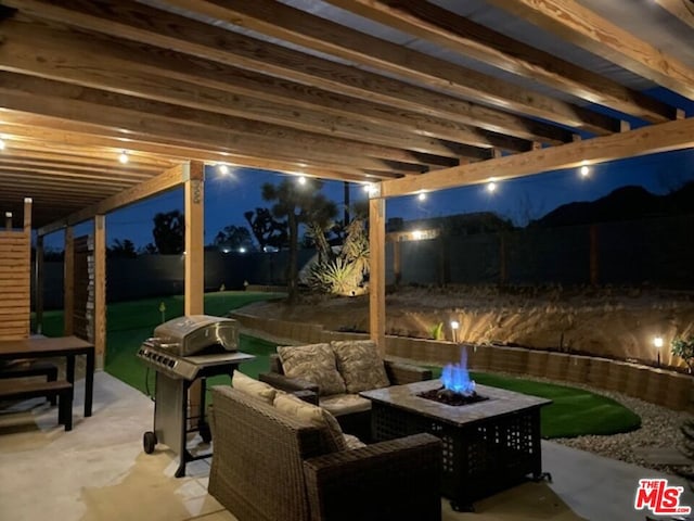 patio at twilight featuring area for grilling and outdoor lounge area