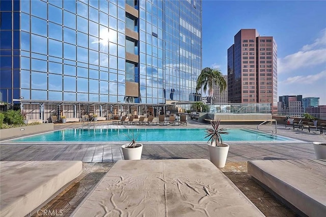 view of swimming pool featuring a patio