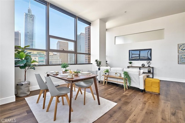 dining room with hardwood / wood-style floors