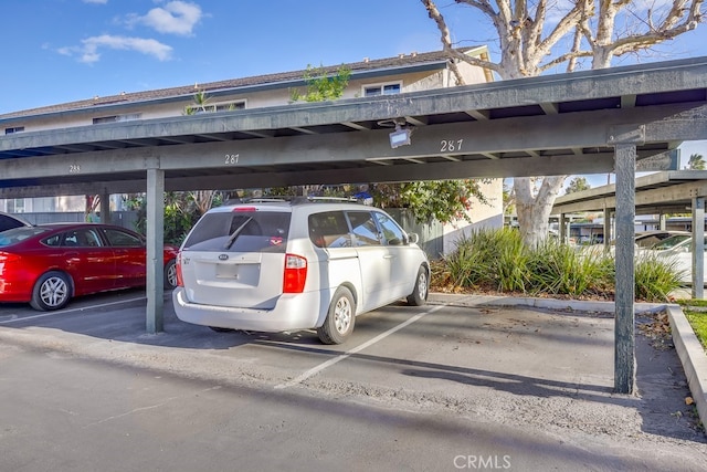 view of car parking with a carport