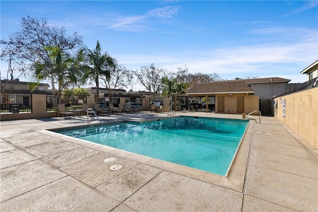 view of pool featuring a patio