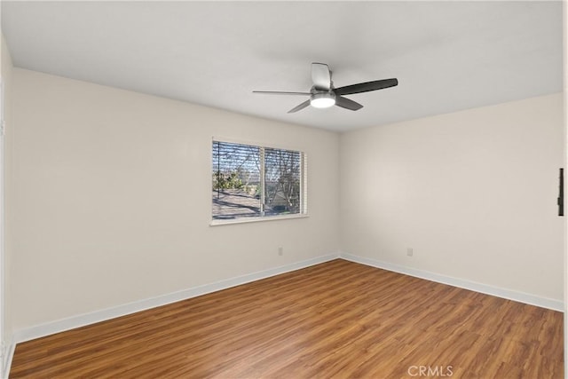 unfurnished room featuring hardwood / wood-style flooring and ceiling fan