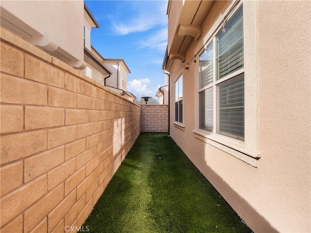 view of home's exterior featuring a lawn