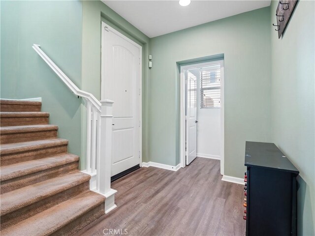 foyer with hardwood / wood-style floors