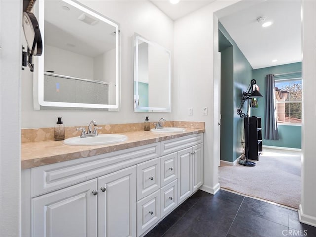 bathroom featuring tile patterned floors and vanity