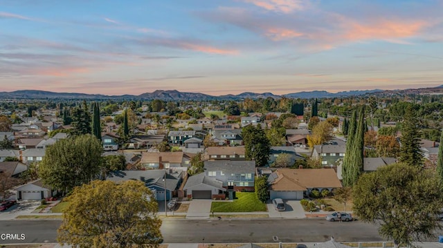 aerial view at dusk with a mountain view