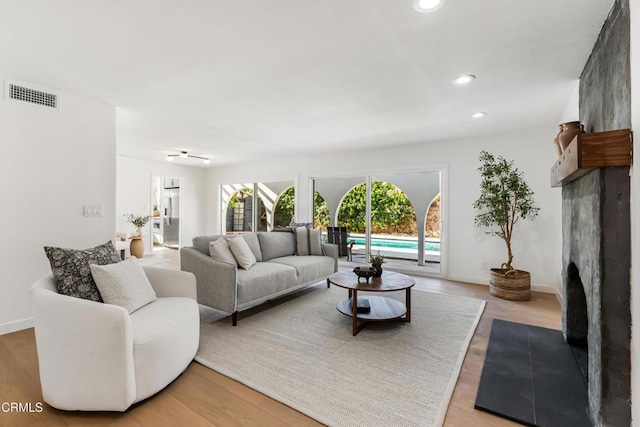 living room featuring light wood-type flooring