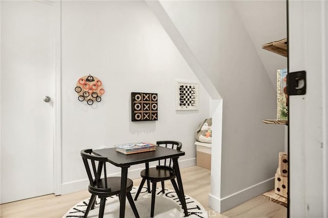 dining area featuring light wood-type flooring