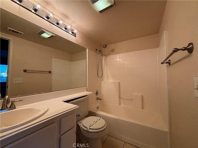 full bathroom featuring tub / shower combination, a textured ceiling, tile patterned floors, vanity, and toilet