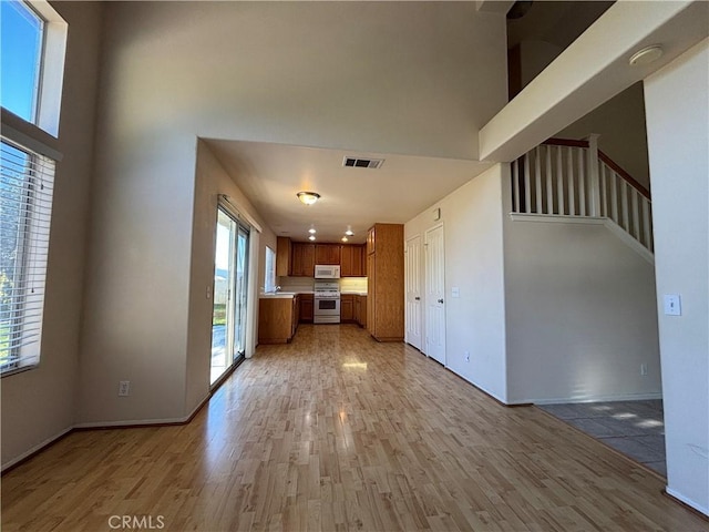 unfurnished living room featuring hardwood / wood-style floors