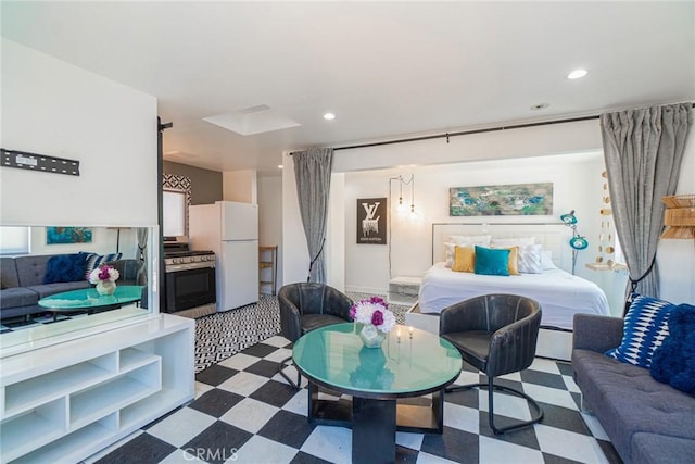 bedroom with white refrigerator