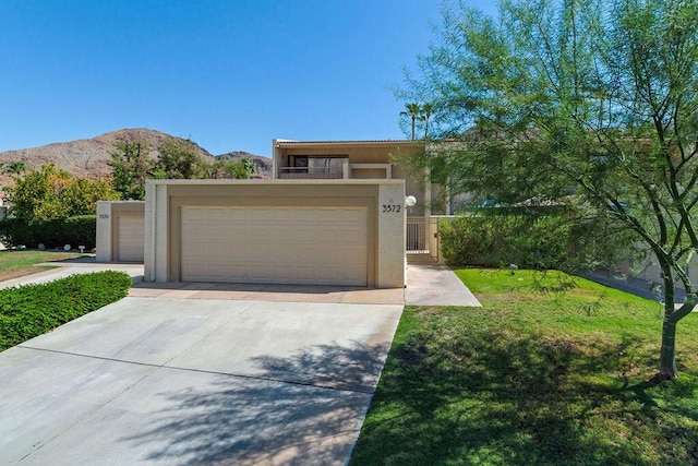 view of front of home featuring a mountain view