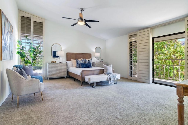 bedroom featuring ceiling fan, carpet floors, and multiple windows