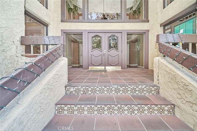 view of exterior entry with french doors