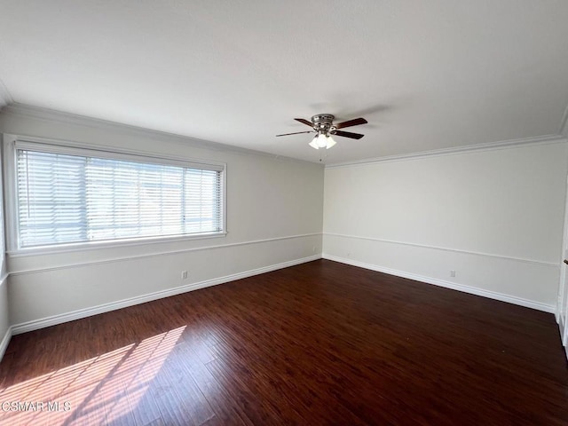 unfurnished room with ceiling fan, crown molding, and dark hardwood / wood-style floors