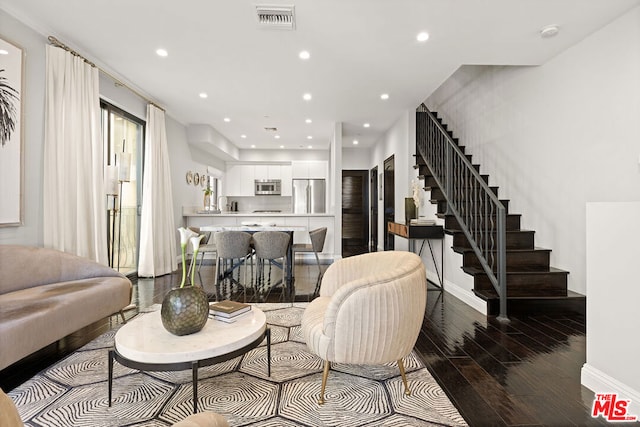 living room featuring dark hardwood / wood-style floors