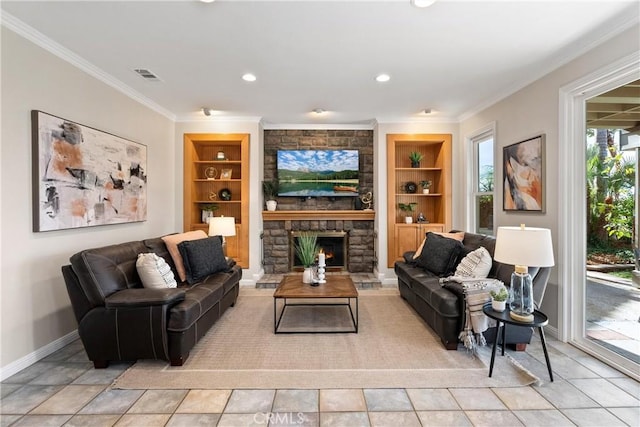 tiled living room featuring ornamental molding, a stone fireplace, and built in shelves