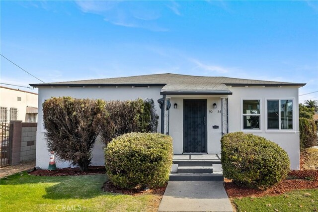 view of front of home with a front yard