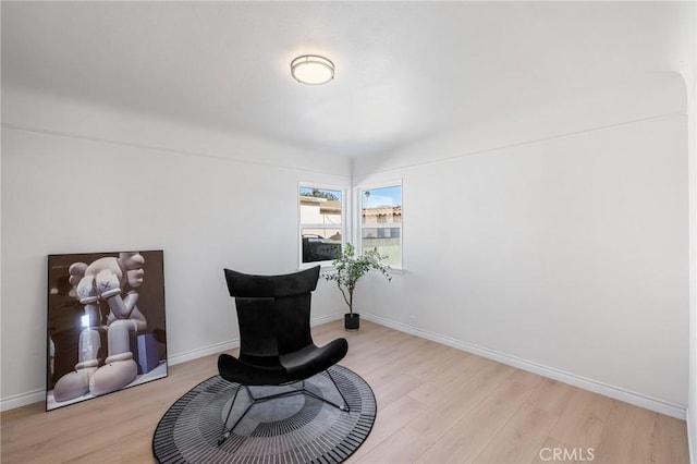 sitting room with light hardwood / wood-style flooring