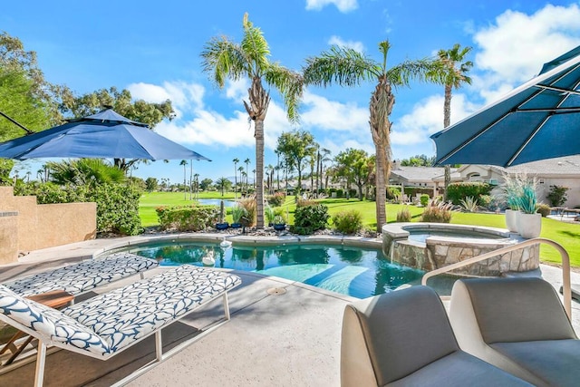 view of pool with an in ground hot tub and a lawn