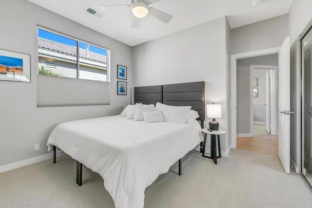 carpeted bedroom featuring ceiling fan