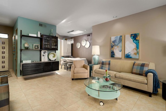 living room featuring light tile patterned flooring