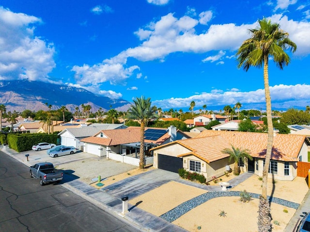 drone / aerial view featuring a mountain view