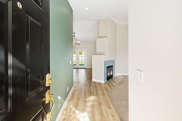 interior space featuring light hardwood / wood-style floors and french doors