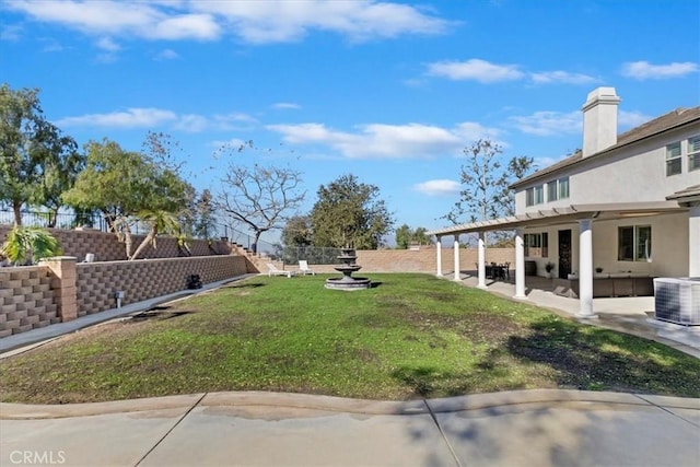 view of yard featuring a patio area, central AC unit, and outdoor lounge area