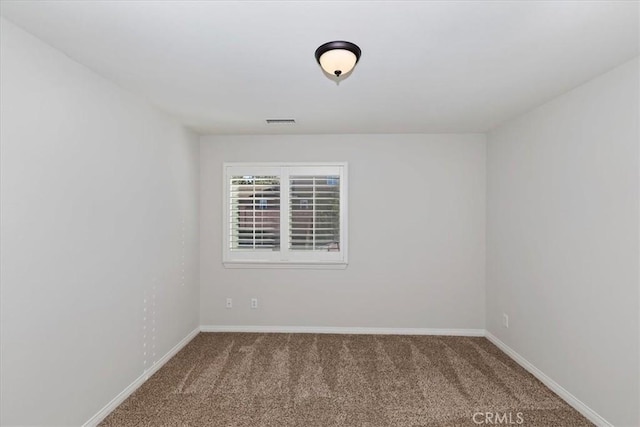 empty room featuring carpet